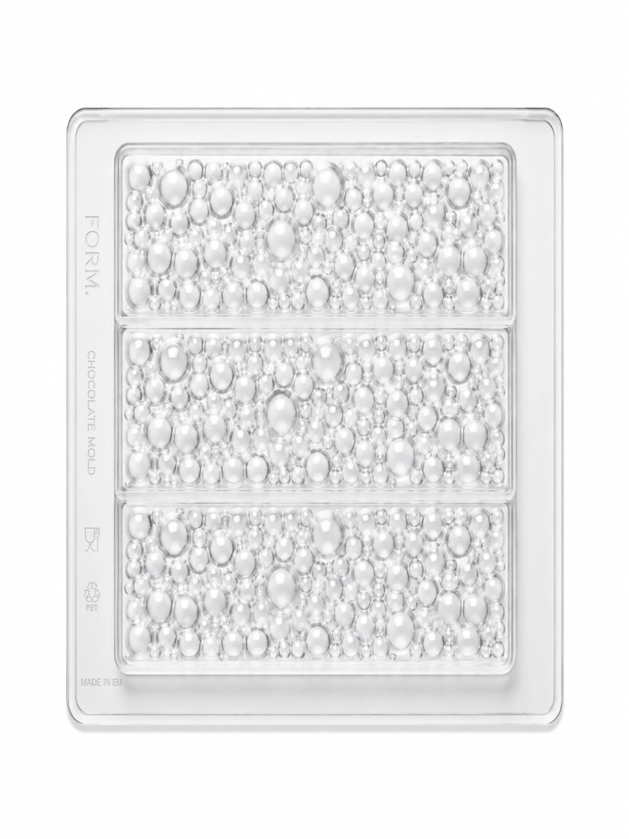 Clear thermoformed chocolate mold with bubble texture by FORM Dubai